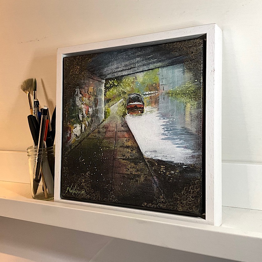 A painting of graffiti on a London canal bridge.