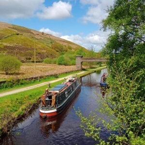 The Art Boat seen from above. Approaching a pipe bridge on the Rochdale canal