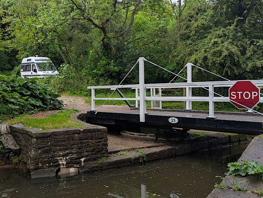 Bobby the campervan moored by lift bridge in Disley